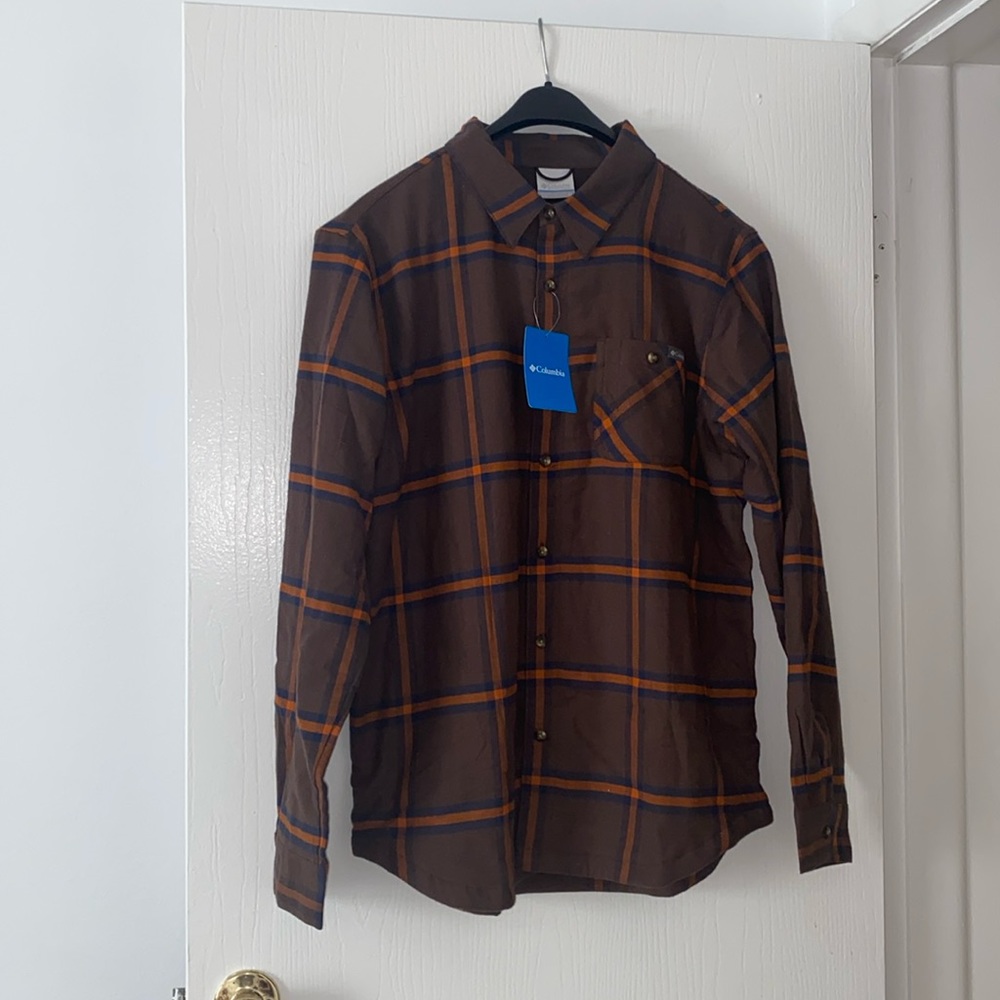 NEW!  Brown plaid Columbia flannel with fleece inside.  Very nice, warm.